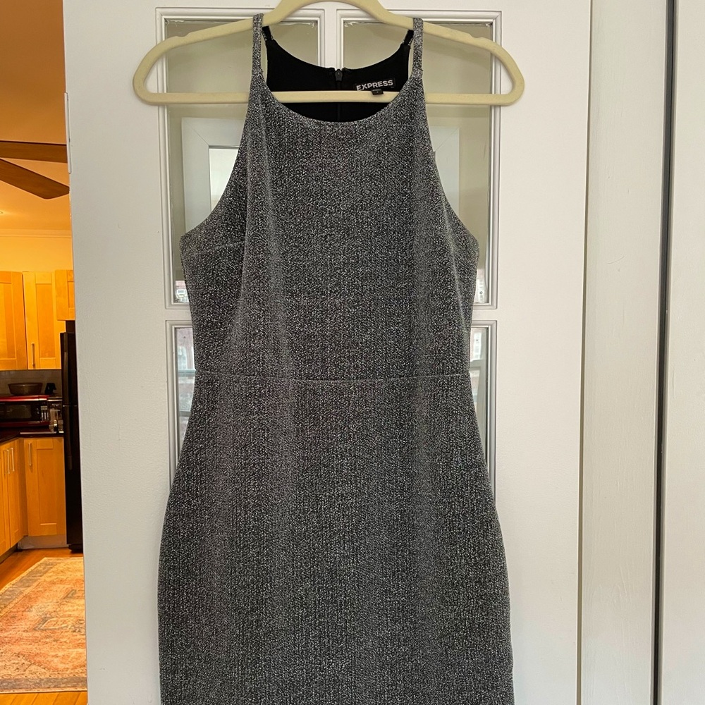 This is a dress I purchased in 2015 from Express. It is Metallic and Polyester.